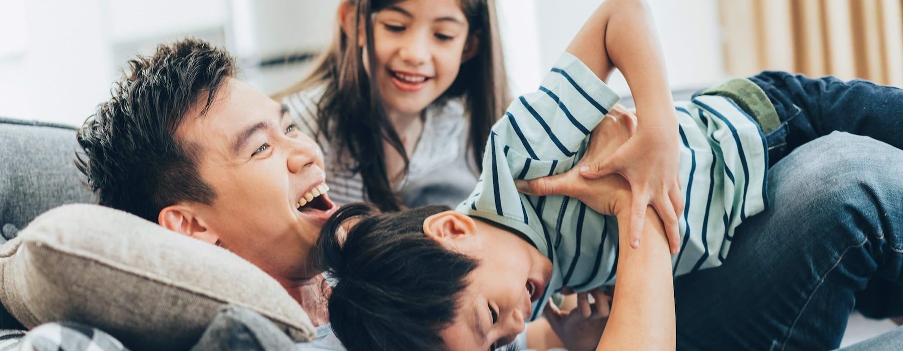 a family playing in a living room